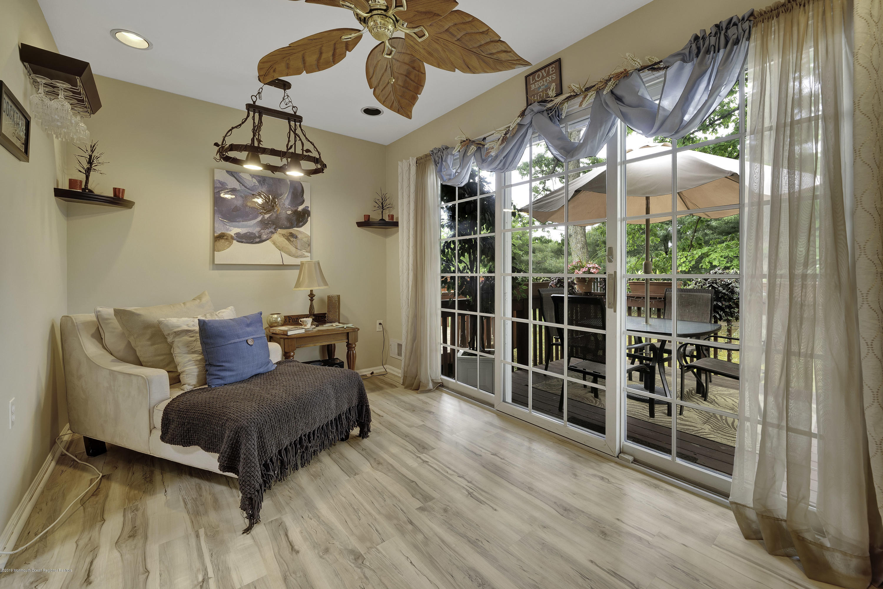 2 Cherrywood Circle, Unit 102 Brick, NJ 08724 - Photo 12 of 26 a living room with furniture and a large window