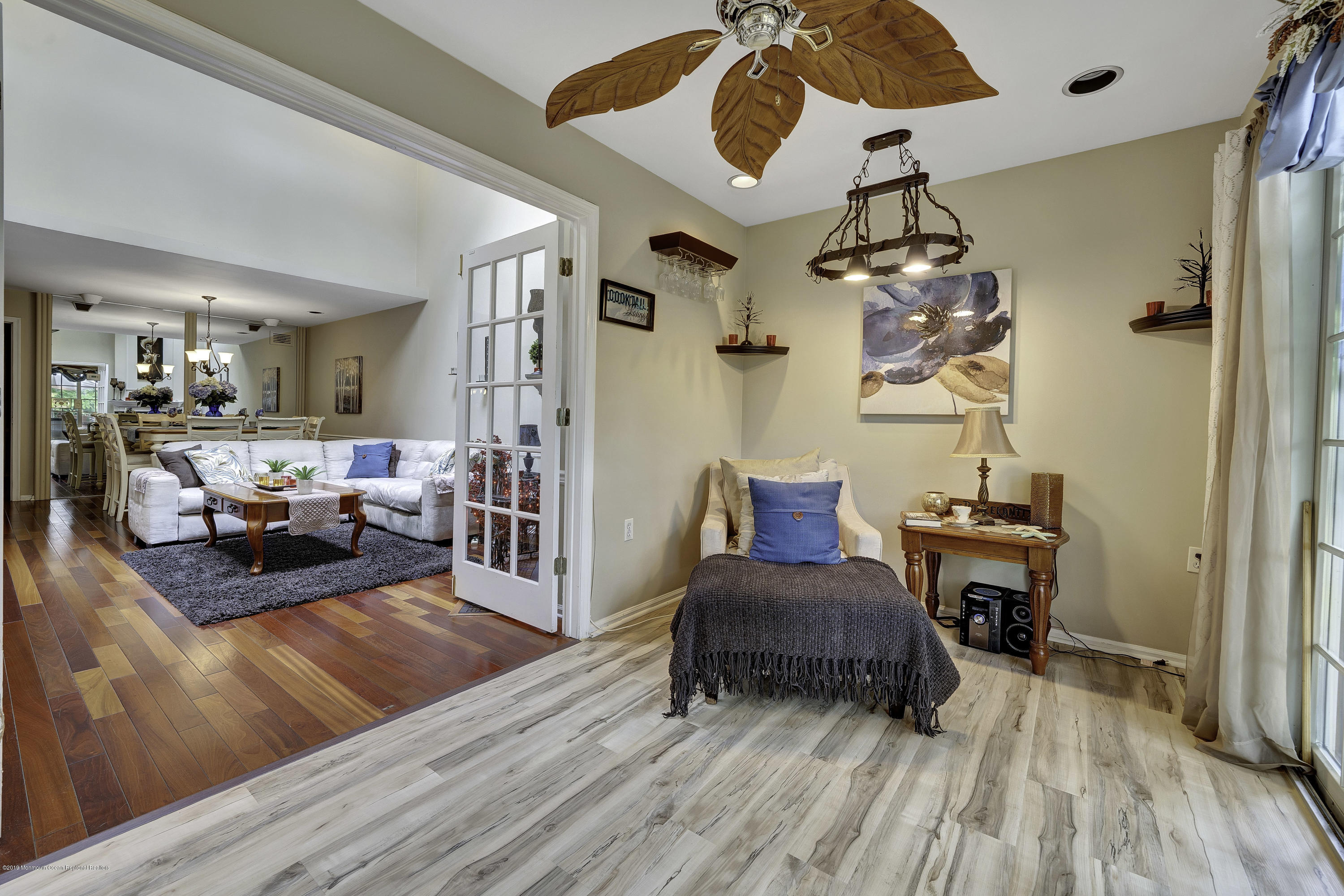 2 Cherrywood Circle, Unit 102 Brick, NJ 08724 - Photo 13 of 26 a living room with furniture and a wooden floor