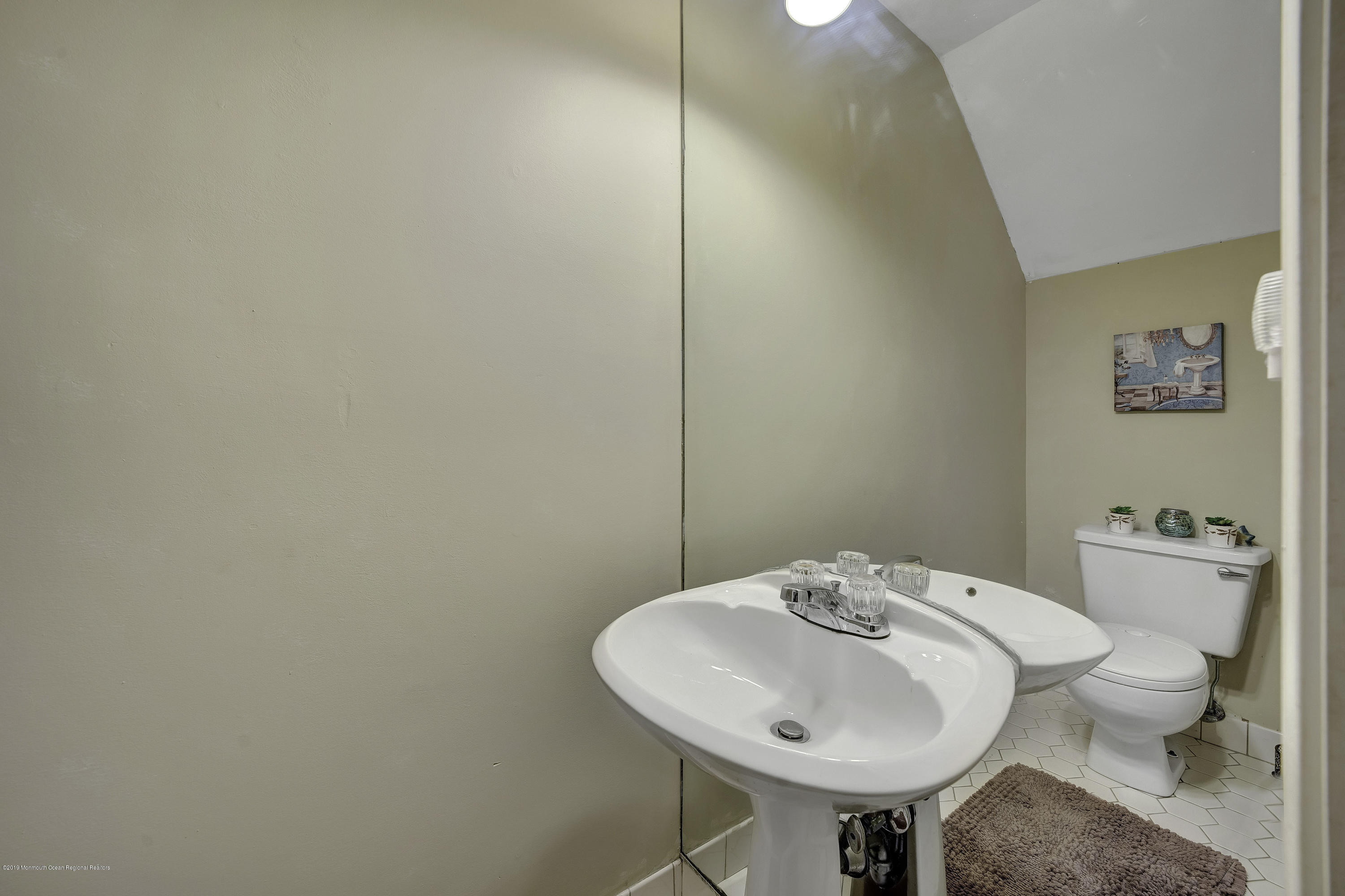 2 Cherrywood Circle, Unit 102 Brick, NJ 08724 - Photo 14 of 26 a bathroom with a sink and a toilet