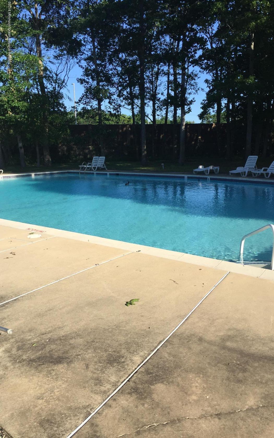 2 Cherrywood Circle, Unit 102 Brick, NJ 08724 - Photo 24 of 26 a view of outdoor space and yard