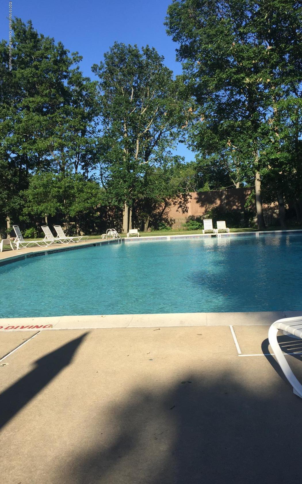 2 Cherrywood Circle, Unit 102 Brick, NJ 08724 - Photo 25 of 26 a view of a garden with an outdoor space