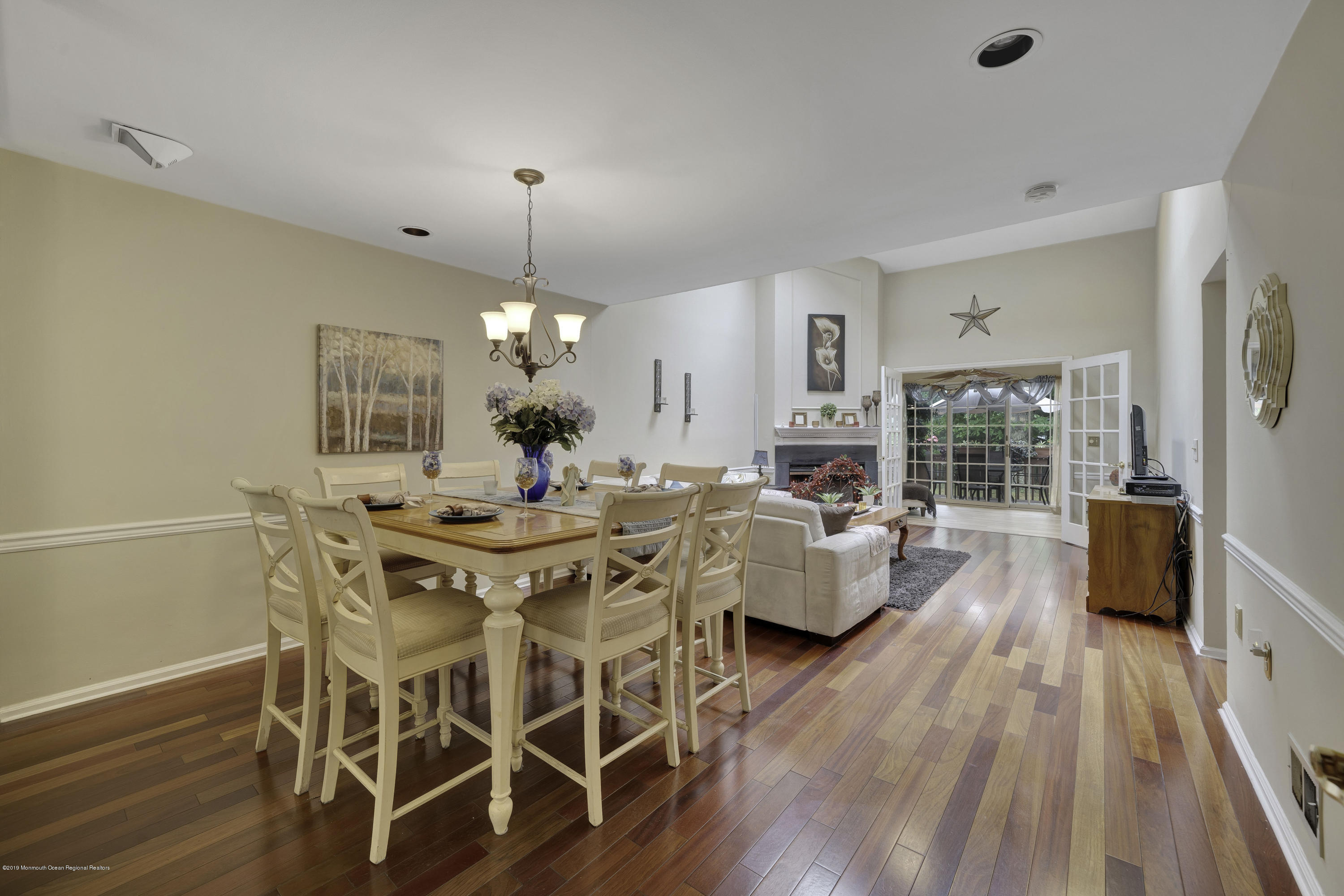 2 Cherrywood Circle, Unit 102 Brick, NJ 08724 - Photo 8 of 26 a view of a dining room with furniture window and wooden floor