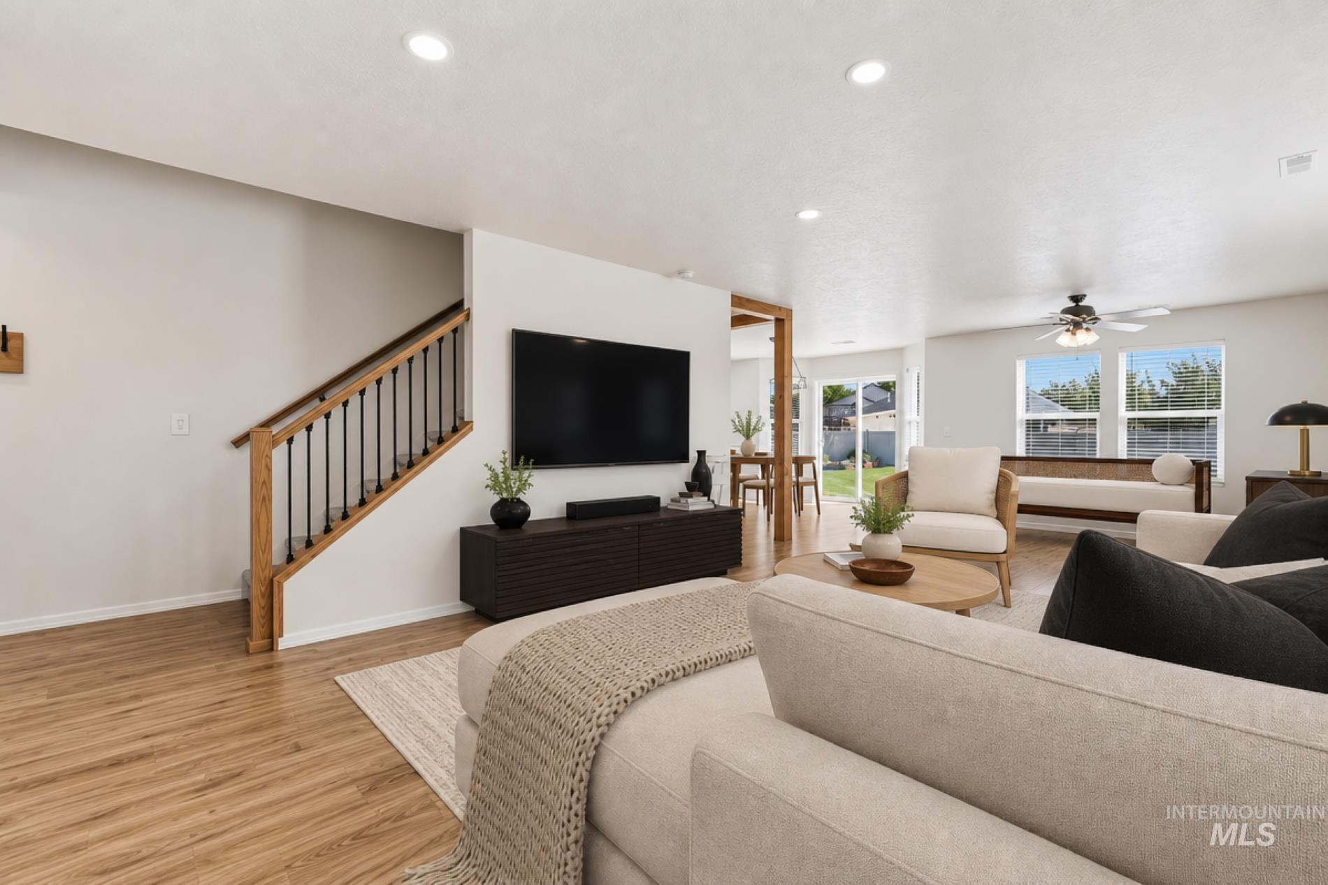 12310 West Hidden Point Drive Star, ID 83669 - Photo 3 of 48 Virtually staged living room to show furniture placement
