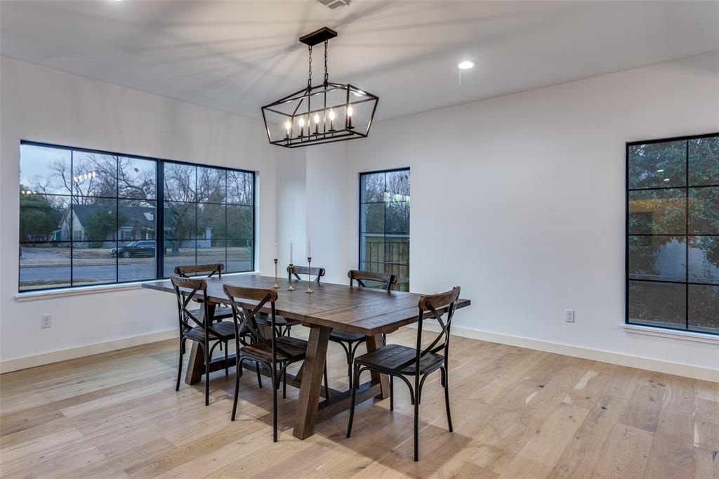 3120 Colcord Avenue Waco, TX 76707 - Photo 6 of 23 a view of a dining room with furniture wooden floor and chandelier