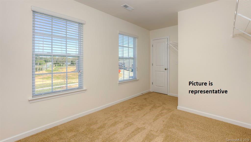8008 Starnes Randall Road Charlotte, NC 28215 - Photo 18 of 25 a view of an empty room with a window