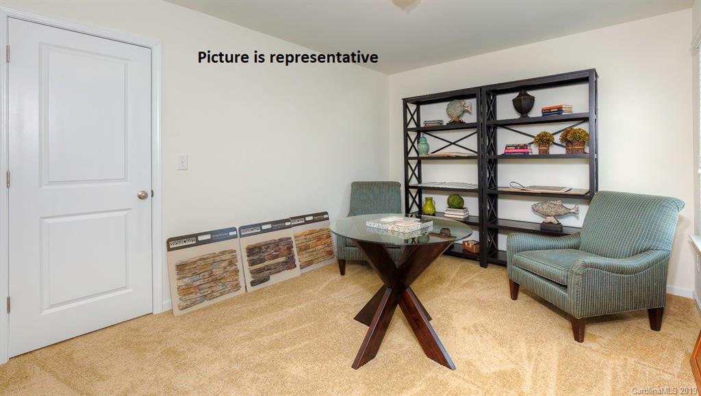 8008 Starnes Randall Road Charlotte, NC 28215 - Photo 21 of 25 a living room with furniture and a painting on the wall