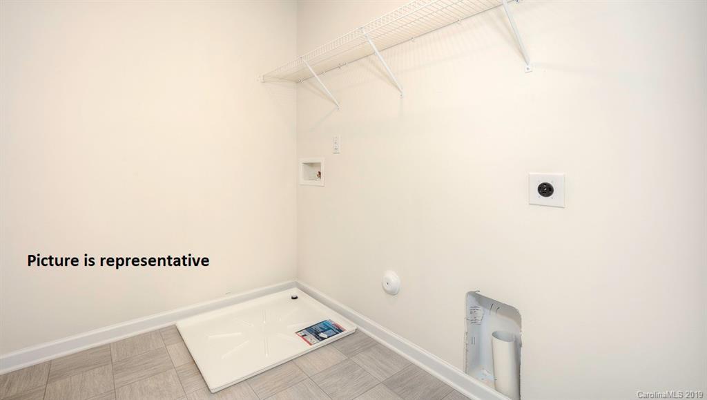 8008 Starnes Randall Road Charlotte, NC 28215 - Photo 25 of 25 a bathroom with a tub and shower