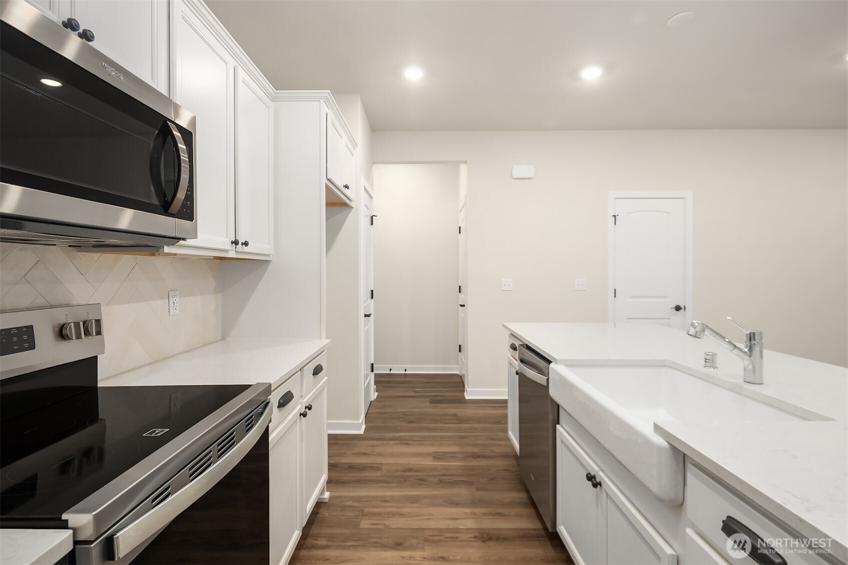 31840 Myrtle Street Carnation, WA 98014 - Photo 12 of 22 a kitchen with a sink and stainless steel appliances