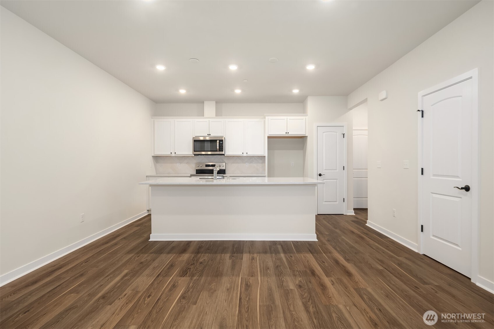 31840 Myrtle Street Carnation, WA 98014 - Photo 6 of 22 a view of kitchen with wooden floor