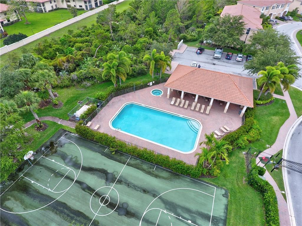 138 Southwest Walking Path Stuart, FL 34997 - Photo 40 of 50 an aerial view of a house with a garden