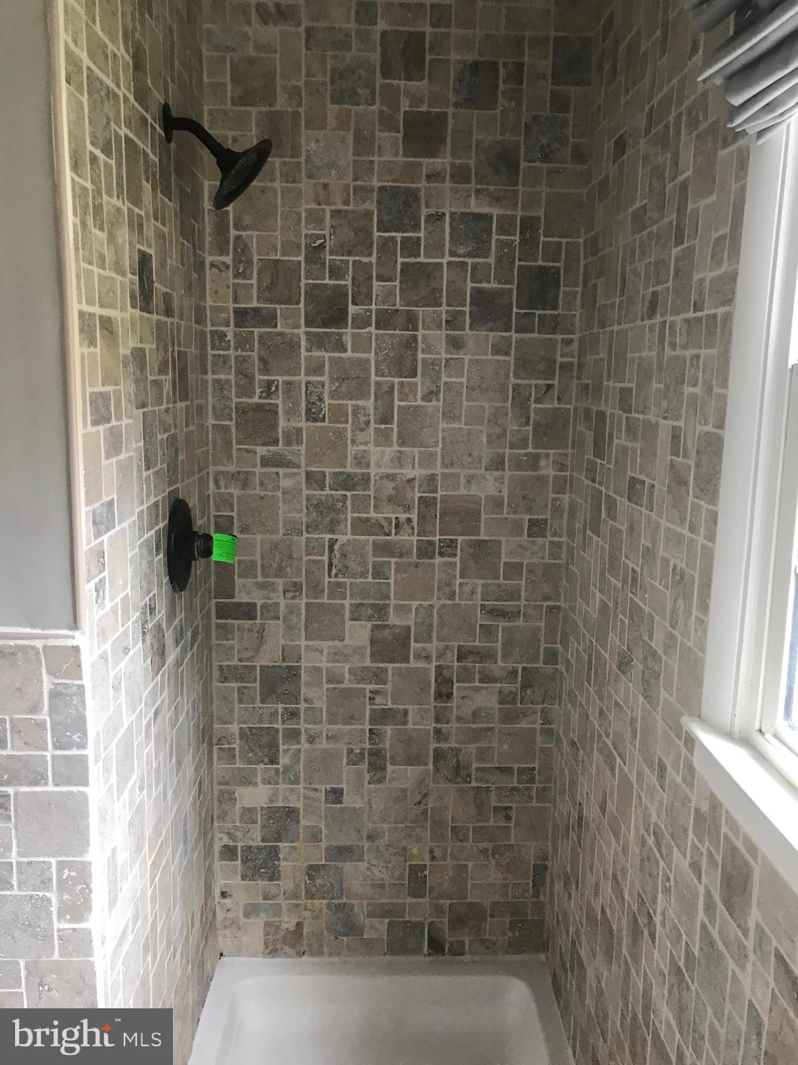 2117 Woodview Road Finksburg, MD 21048 - Photo 8 of 19 a bathroom with a shower