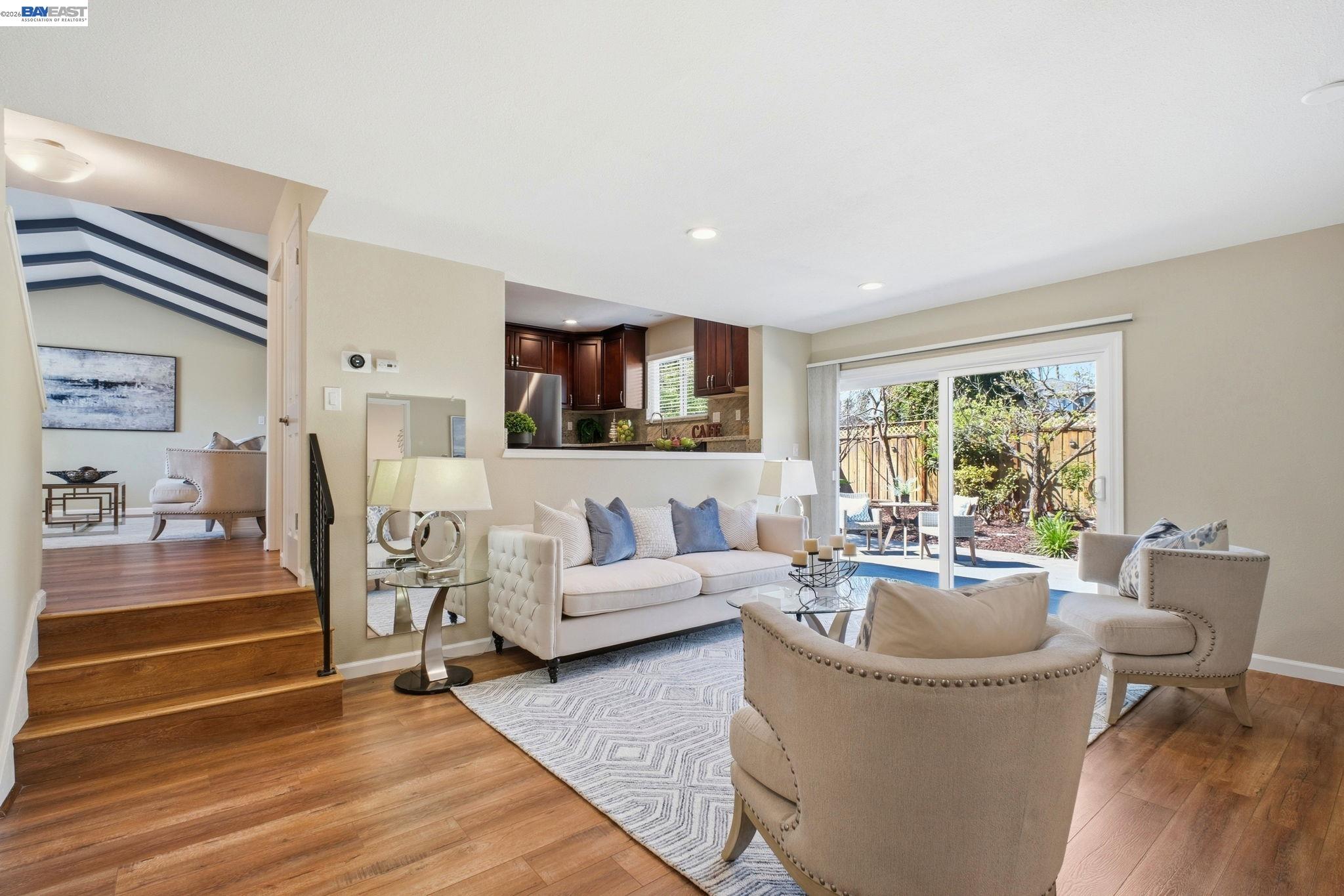 595 Seville Place Fremont, CA 94539 - Photo 12 of 43 a living room with furniture and a large window