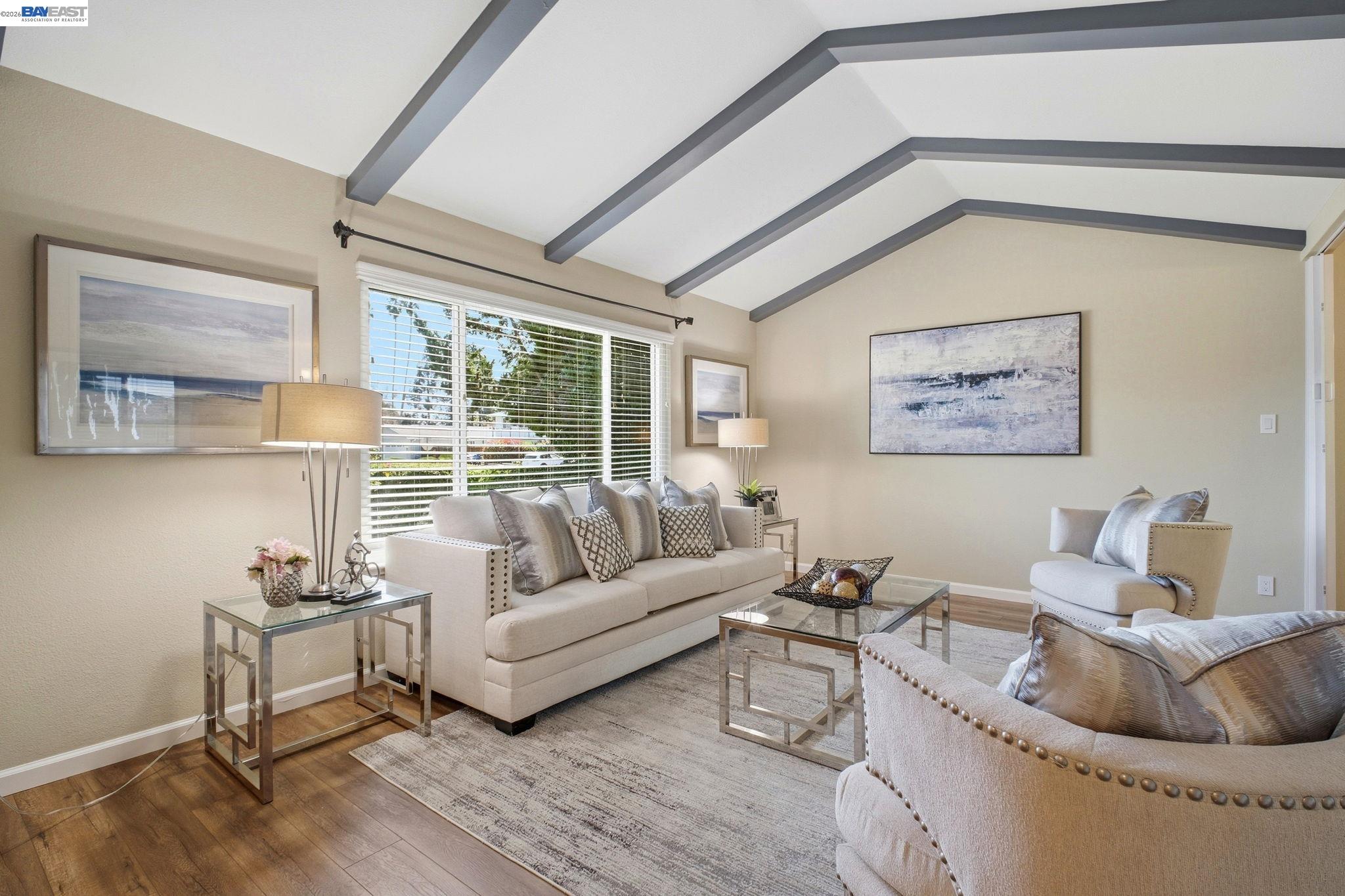 595 Seville Place Fremont, CA 94539 - Photo 3 of 43 a living room with furniture and a large window