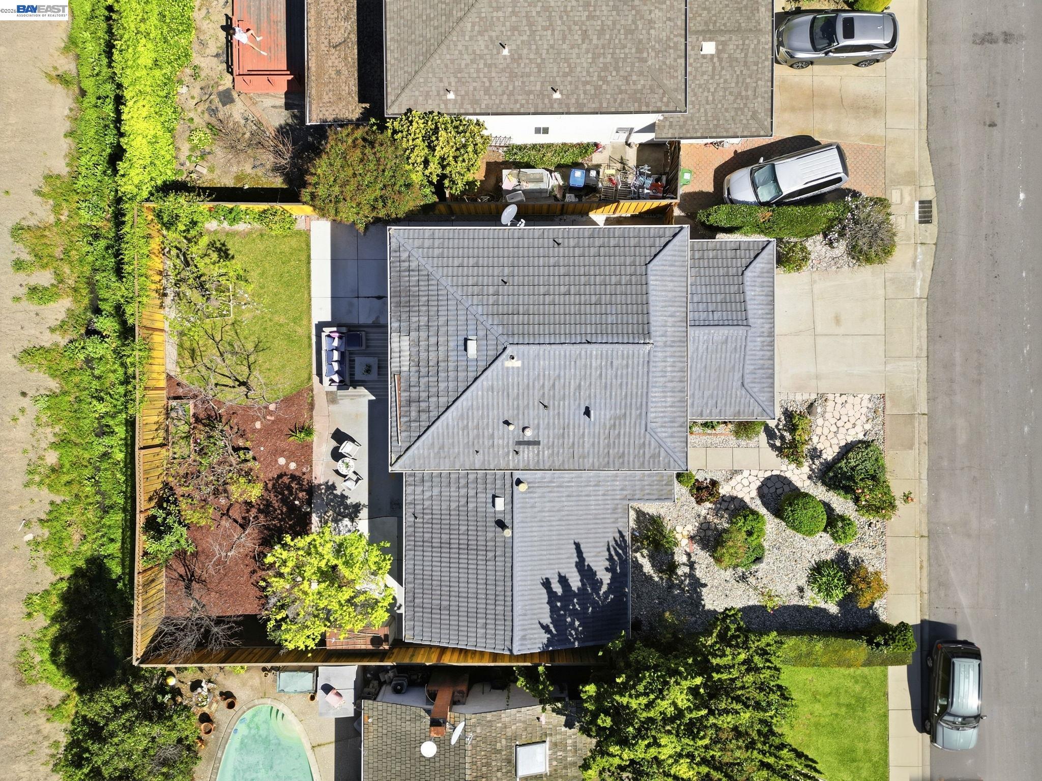 595 Seville Place Fremont, CA 94539 - Photo 35 of 43 an aerial view of a house with a yard and garden