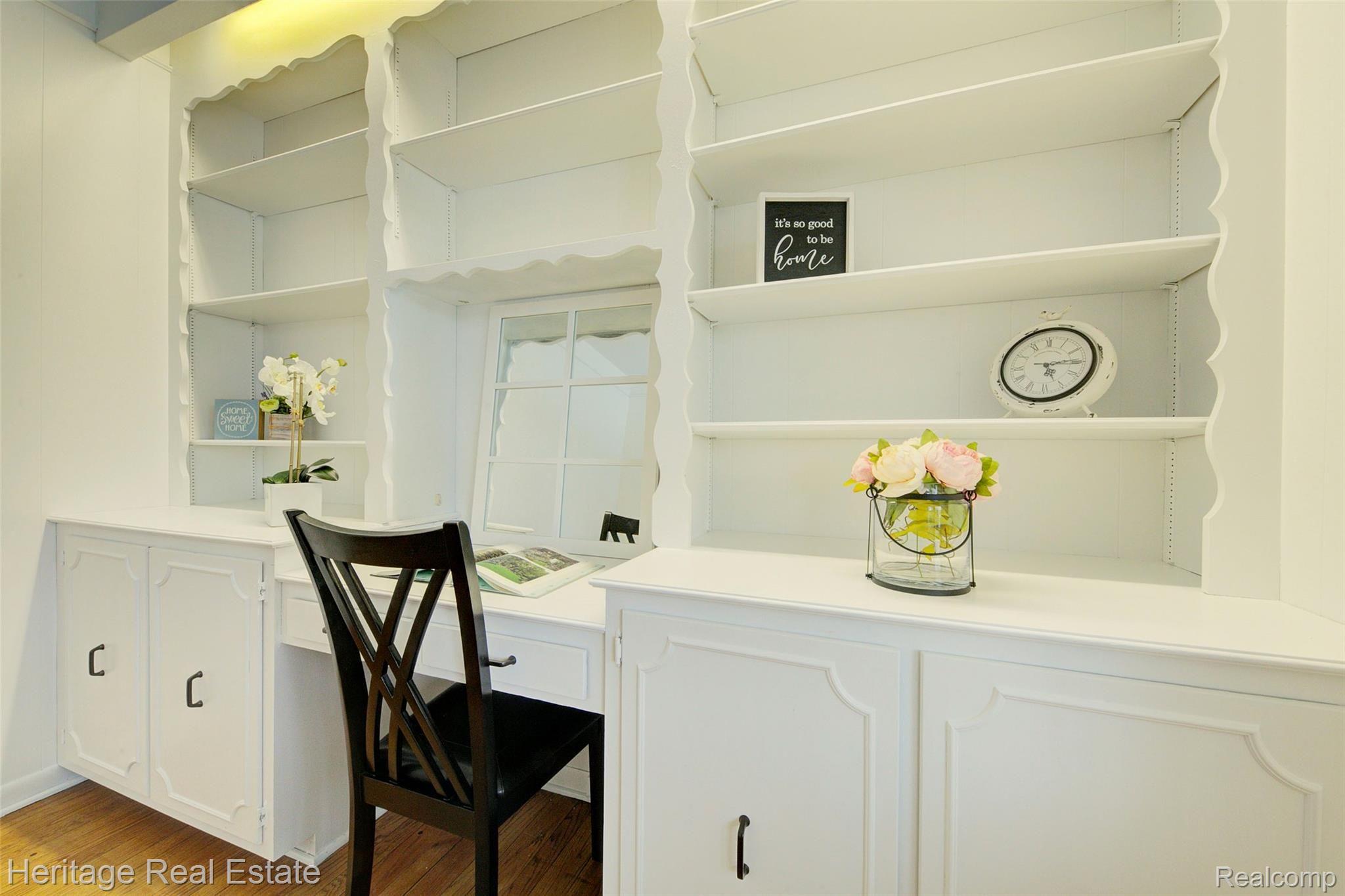 654 Old Perch Road Rochester, MI 48309 - Photo 14 of 61 Fantastic office/library with built-in cabinetry and hardwood flooring is right off the front foyer