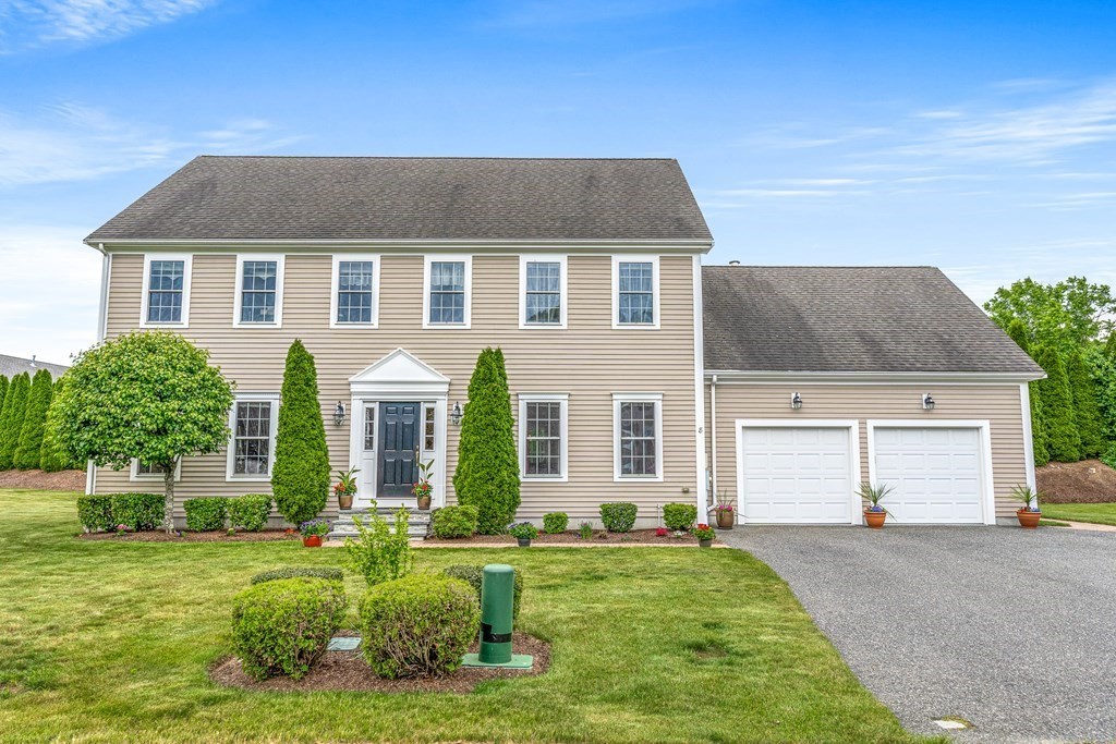 8 Rons Way Framingham, MA 01701 - Photo 1 of 33 a front view of a house with a yard