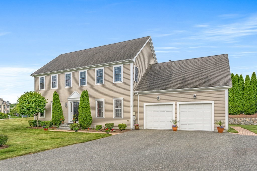 8 Rons Way Framingham, MA 01701 - Photo 3 of 33 front view of a house with a street