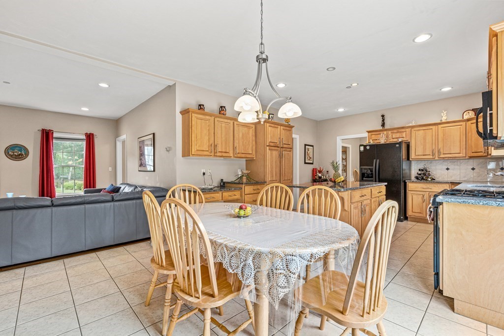 8 Rons Way Framingham, MA 01701 - Photo 6 of 33 a view of a dining room with furniture