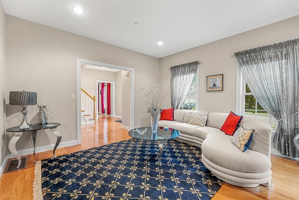 8 Rons Way Framingham, MA 01701 - Photo 10 of 33 a living room with furniture and a couch