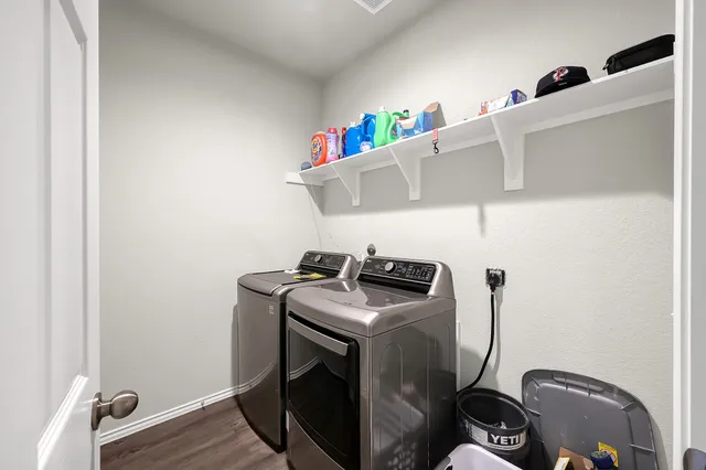 a utility room with dryer and washer