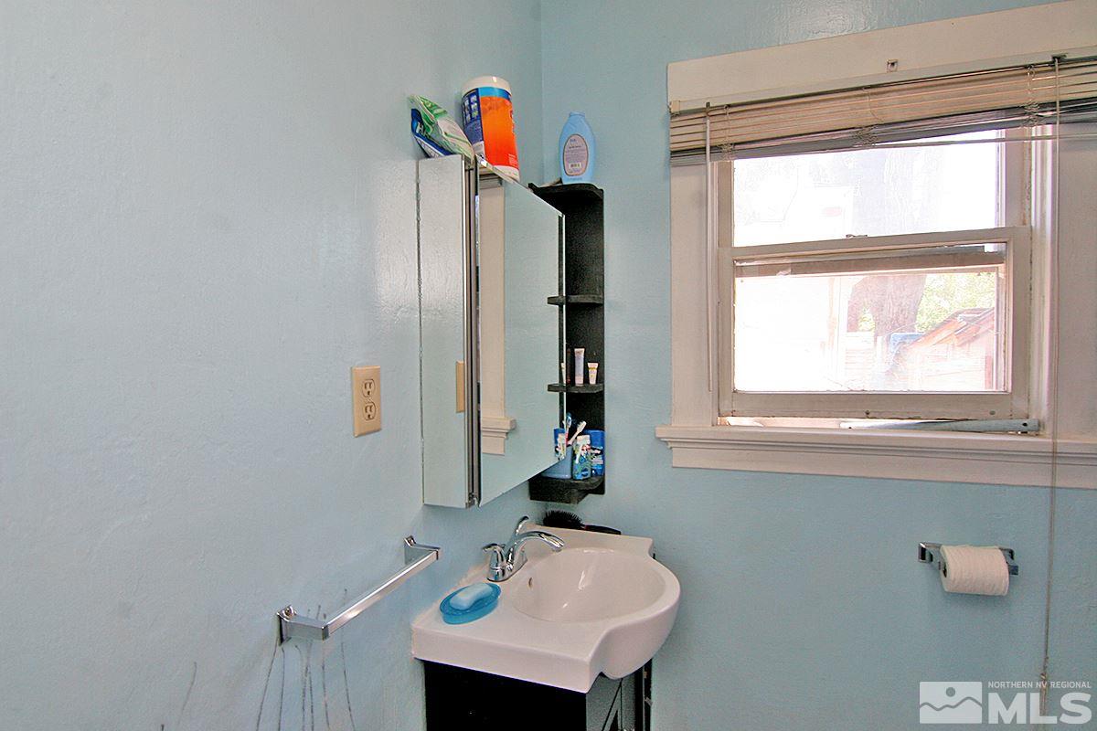 530 East Taylor Street Reno, NV 89502 - Photo 21 of 25 a bathroom with a sink and a window
