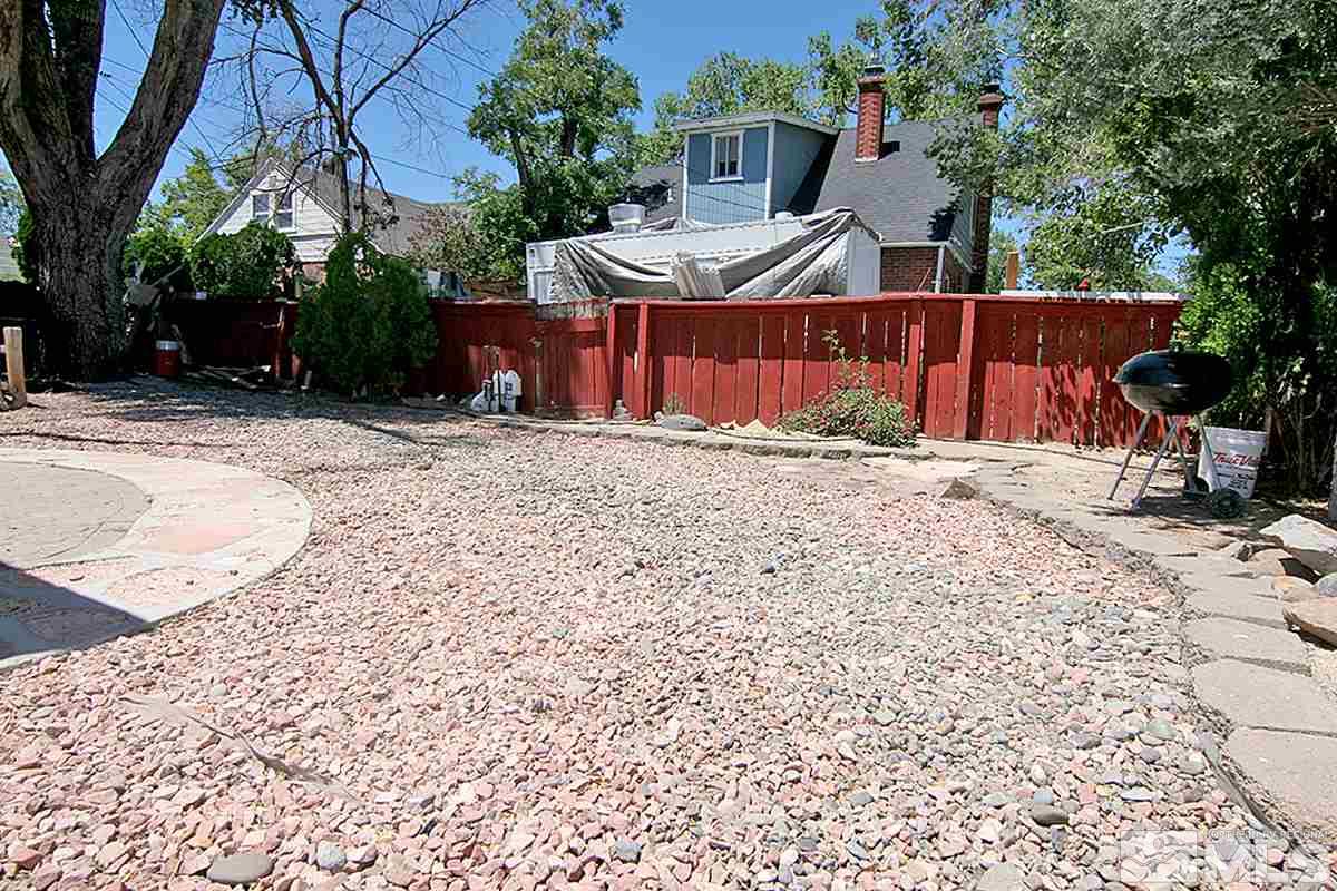 530 East Taylor Street Reno, NV 89502 - Photo 22 of 25 a view of a backyard with a large tree