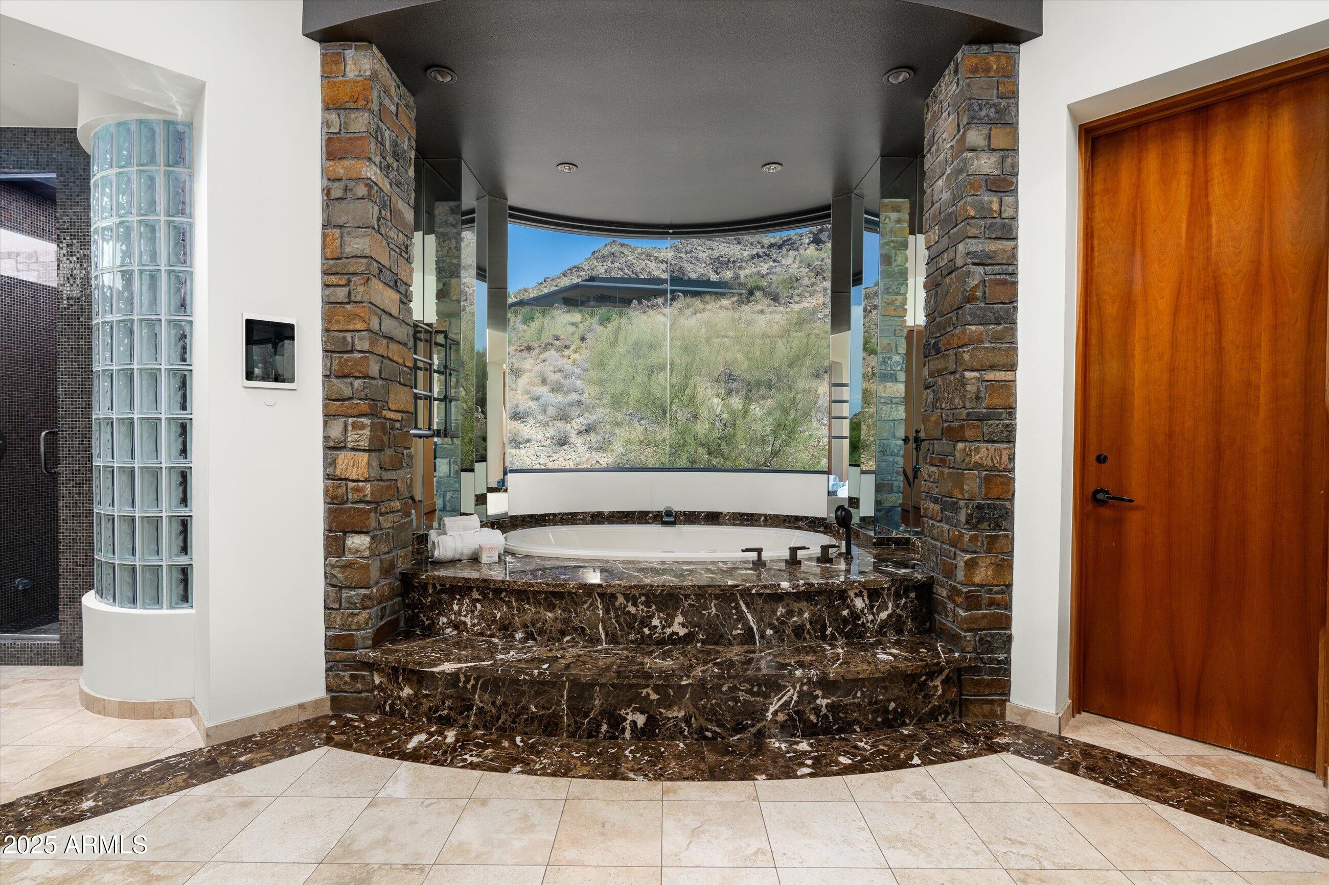 7451 North Las Brisas Lane Paradise Valley, AZ 85253 - Photo 19 of 65 Primary Bathroom with Privacy Glass