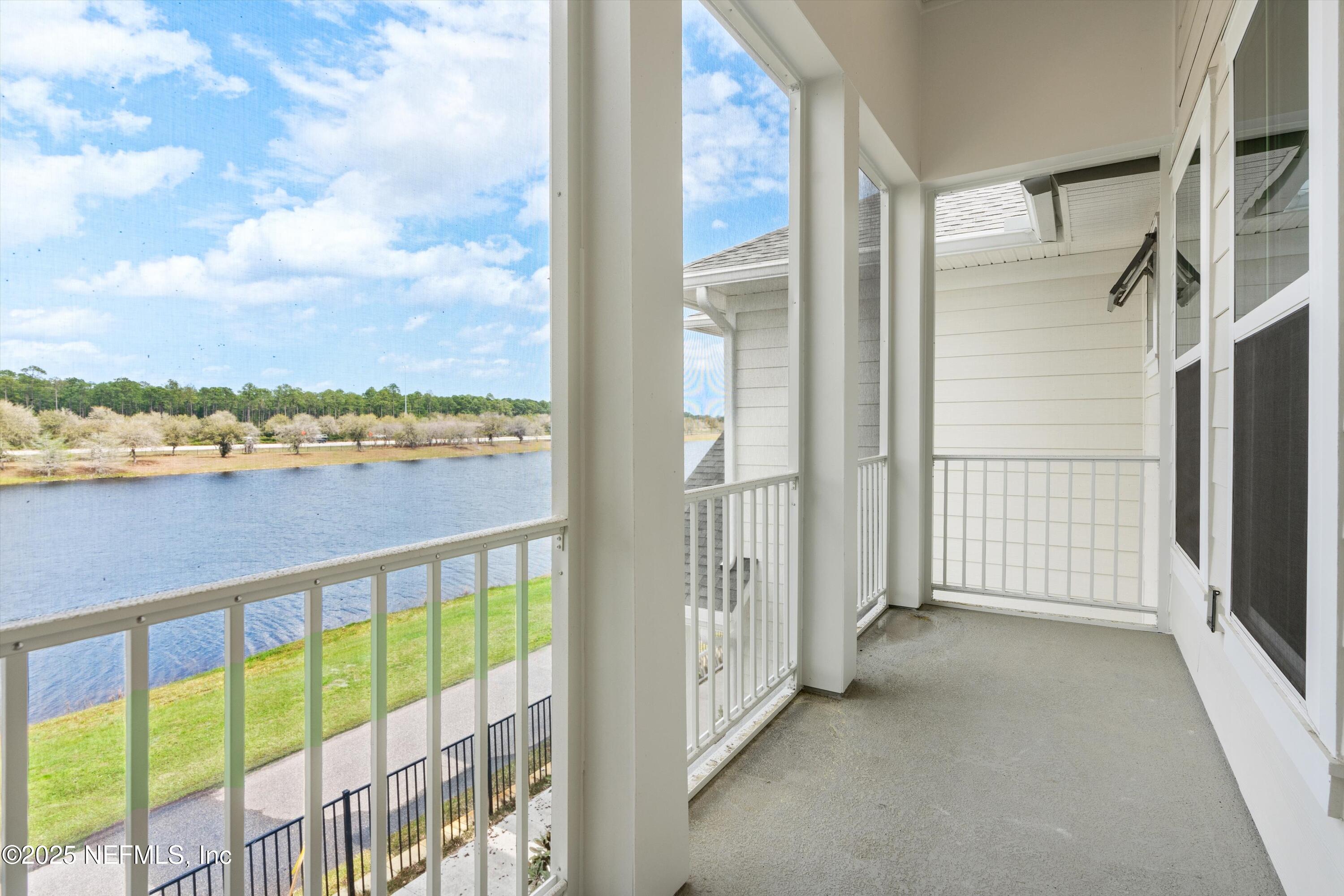 a view of a balcony with city view