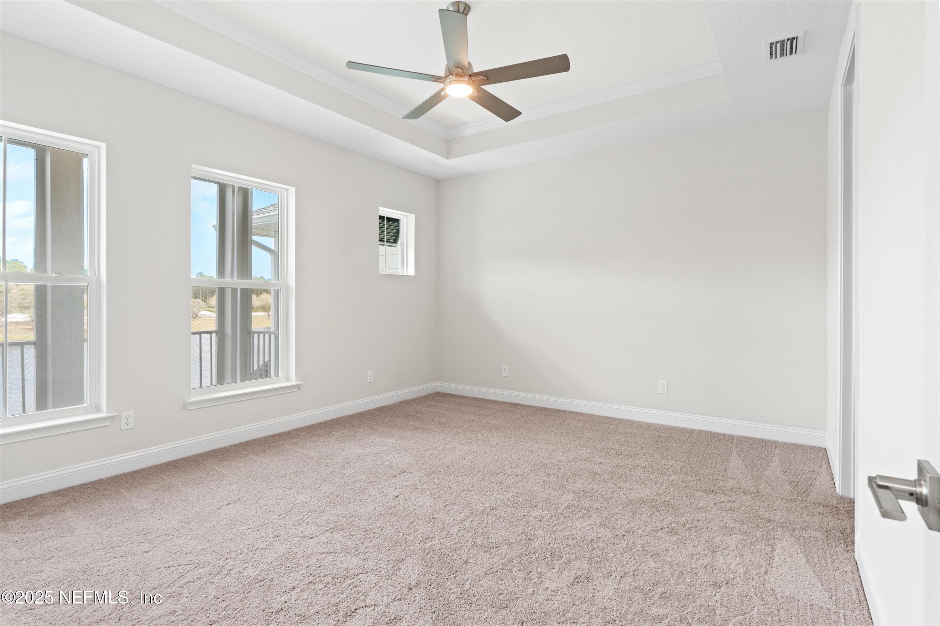 68 Sewall Lane Ponte Vedra, FL 32081 - Photo 16 of 39 an empty room with a window and a ceiling fan