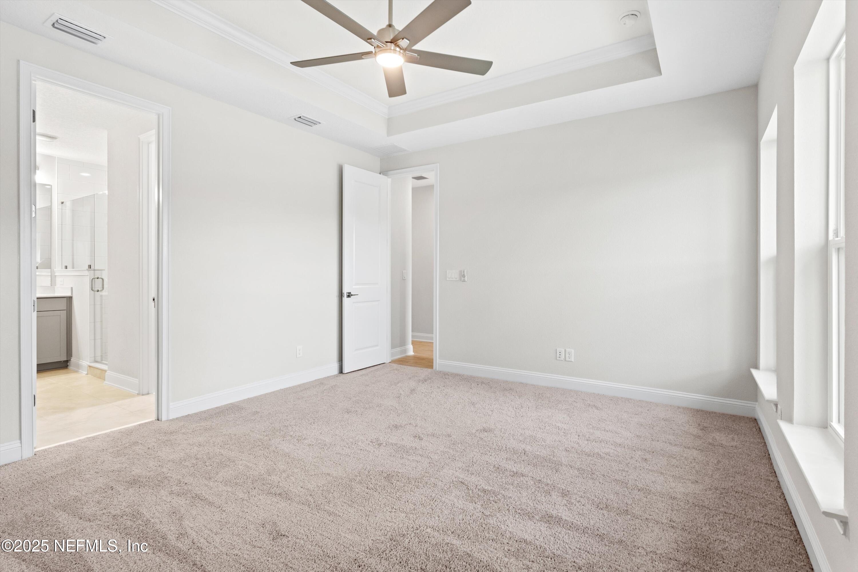 68 Sewall Lane Ponte Vedra, FL 32081 - Photo 17 of 39 an empty room with fan and entryway