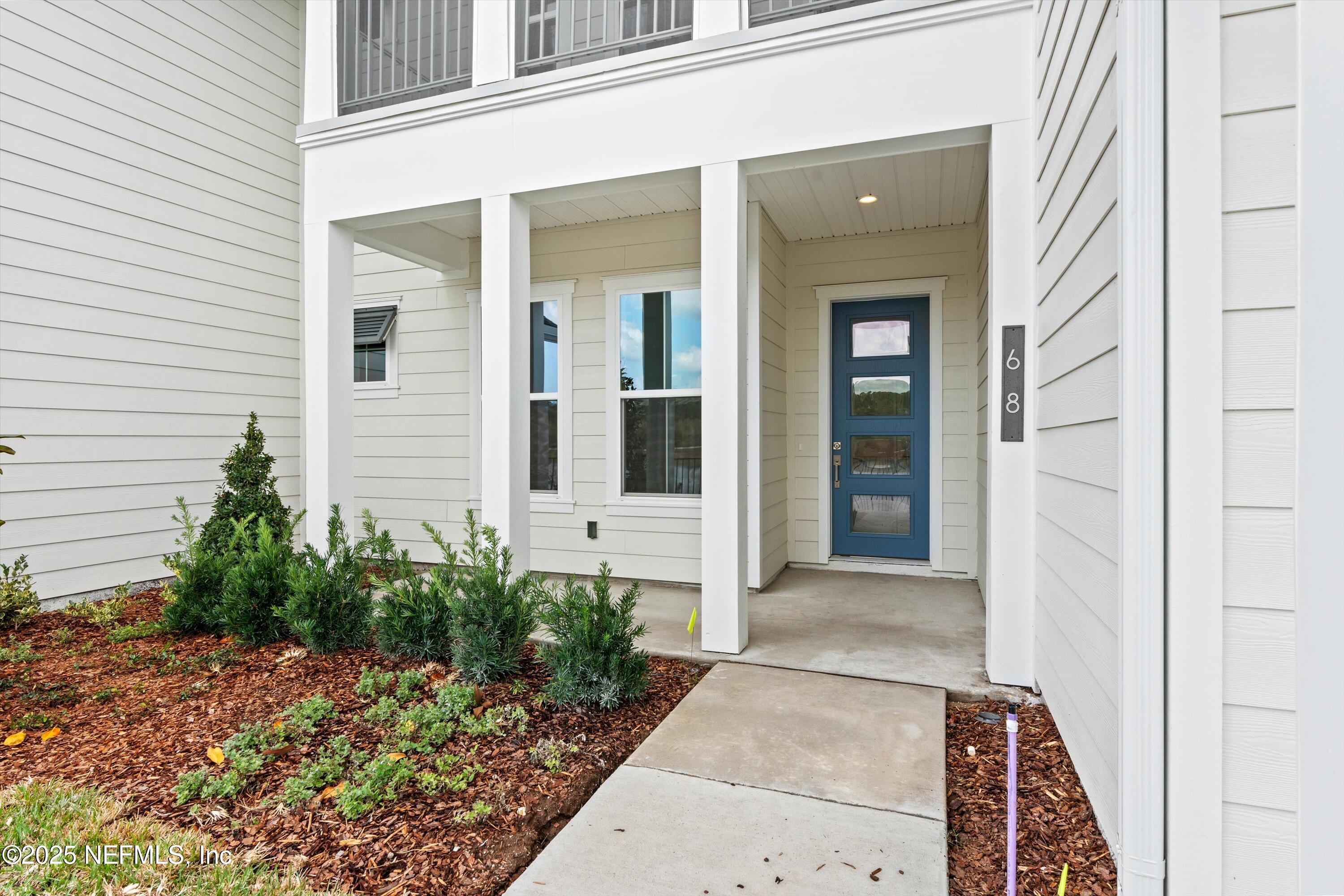 68 Sewall Lane Ponte Vedra, FL 32081 - Photo 2 of 39 front view of a house with a porch