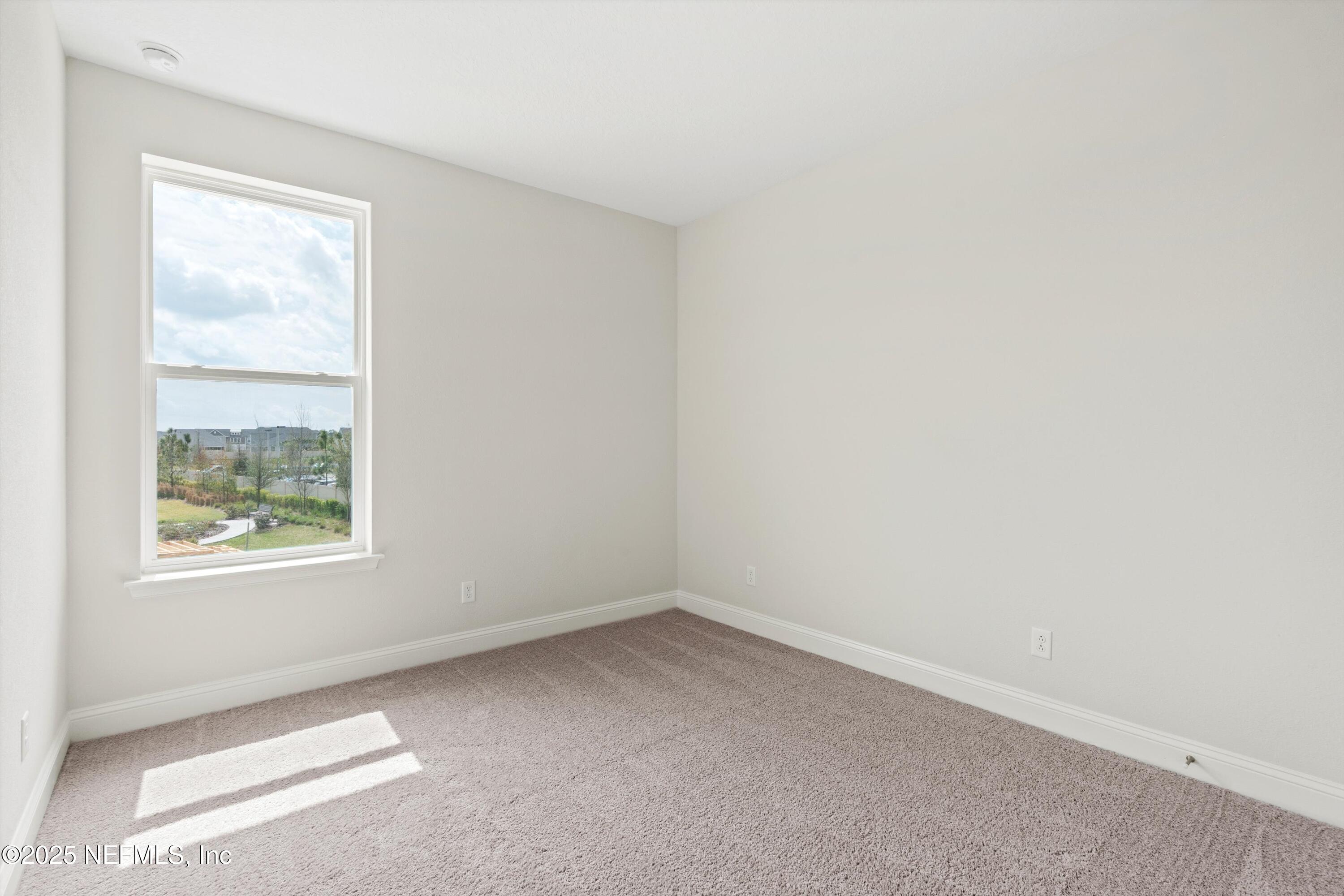 68 Sewall Lane Ponte Vedra, FL 32081 - Photo 22 of 39 an empty room with a window