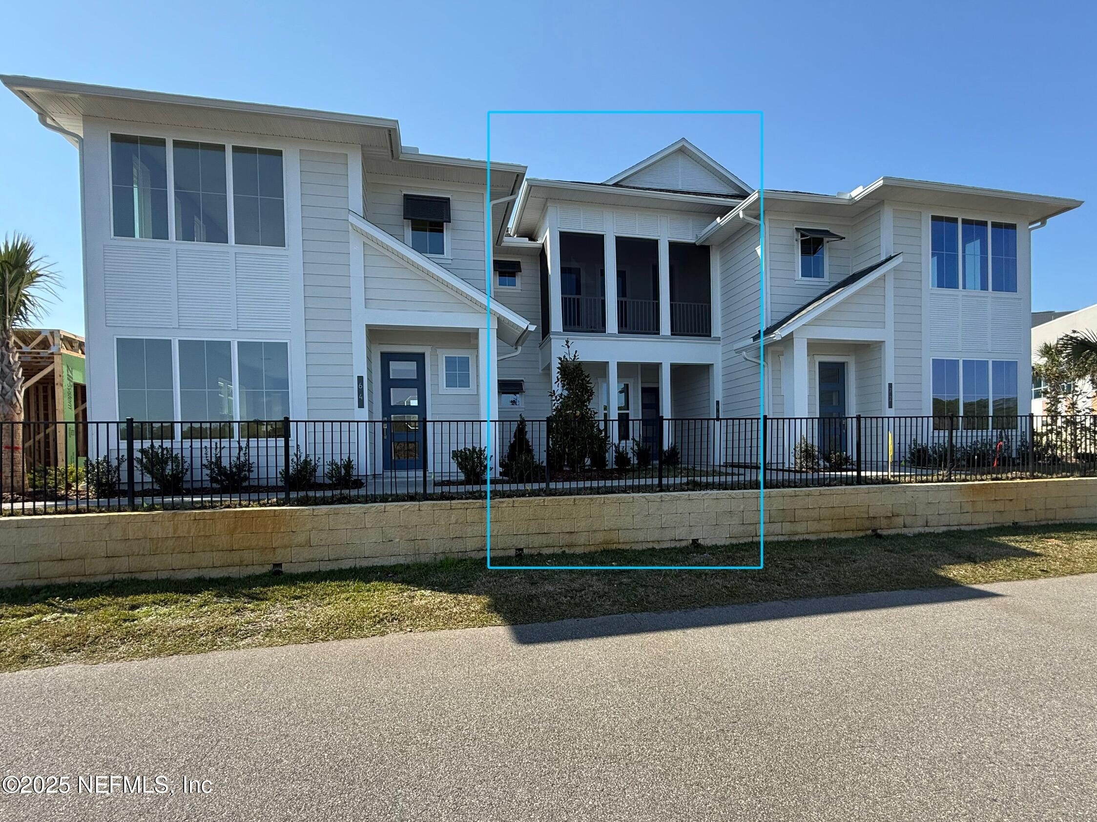 68 Sewall Lane Ponte Vedra, FL 32081 - Photo 5 of 39 a front view of a house with a yard