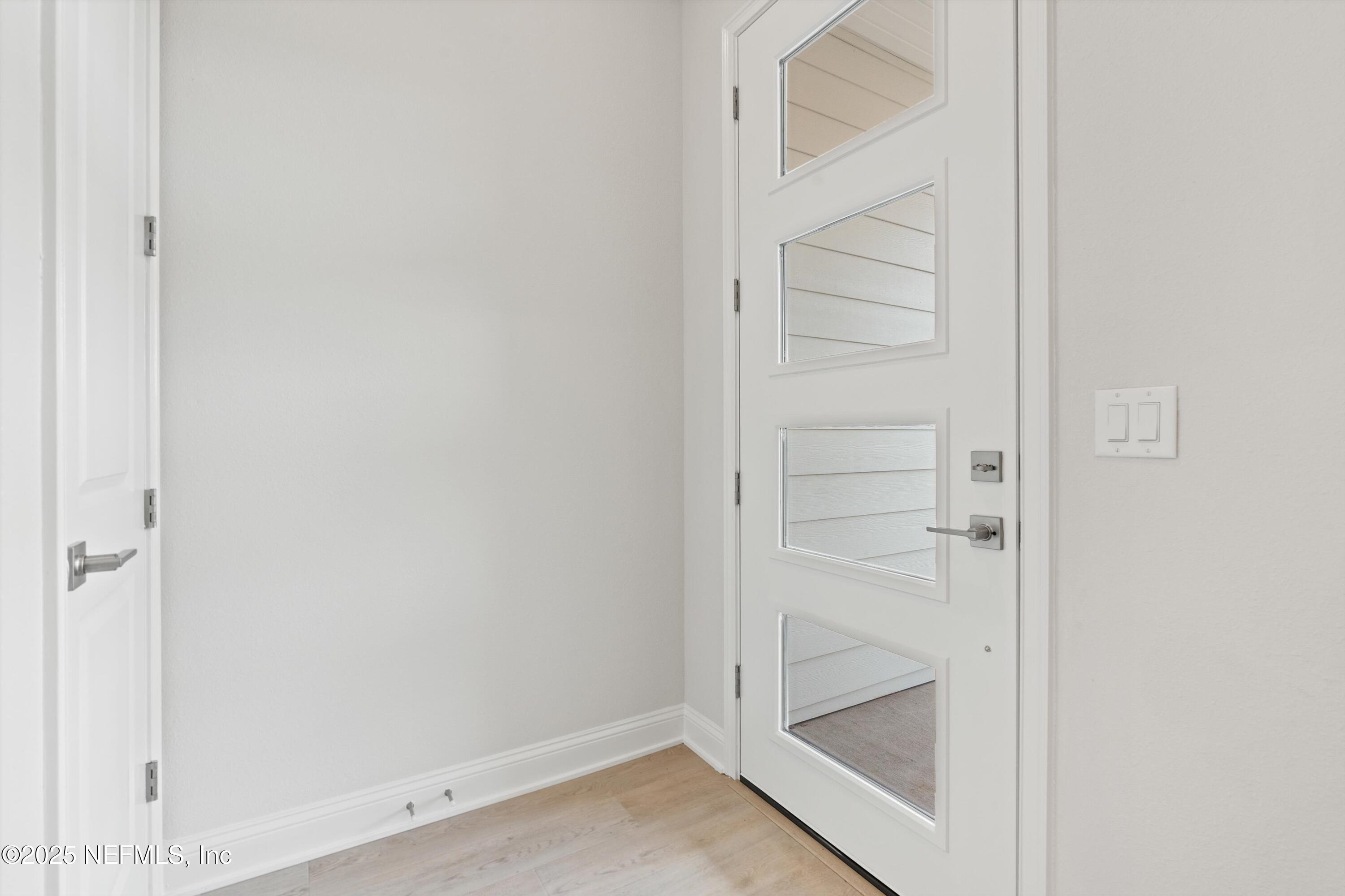 68 Sewall Lane Ponte Vedra, FL 32081 - Photo 6 of 39 a view of an empty walk in closet with a window