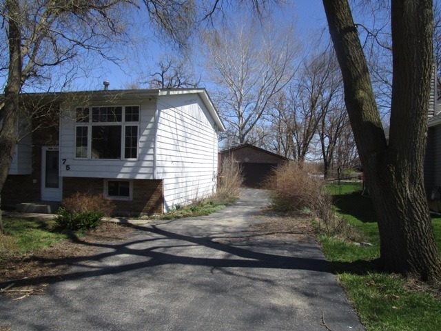 75 Tweed Road Fox Lake, IL 60020 - Photo 3 of 17 a view of a house with a yard