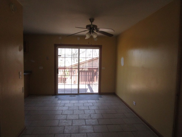 75 Tweed Road Fox Lake, IL 60020 - Photo 8 of 17 a view of an empty room with a window