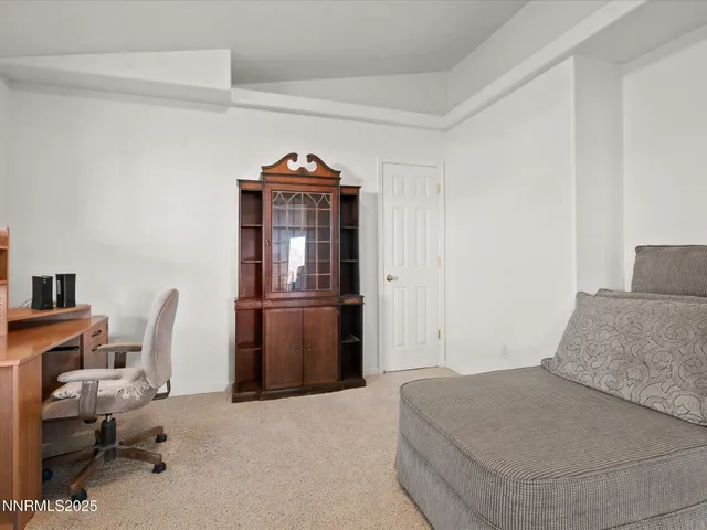 an empty room with a empty space and windows