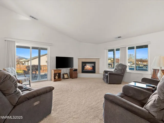 a living room with furniture and a couch