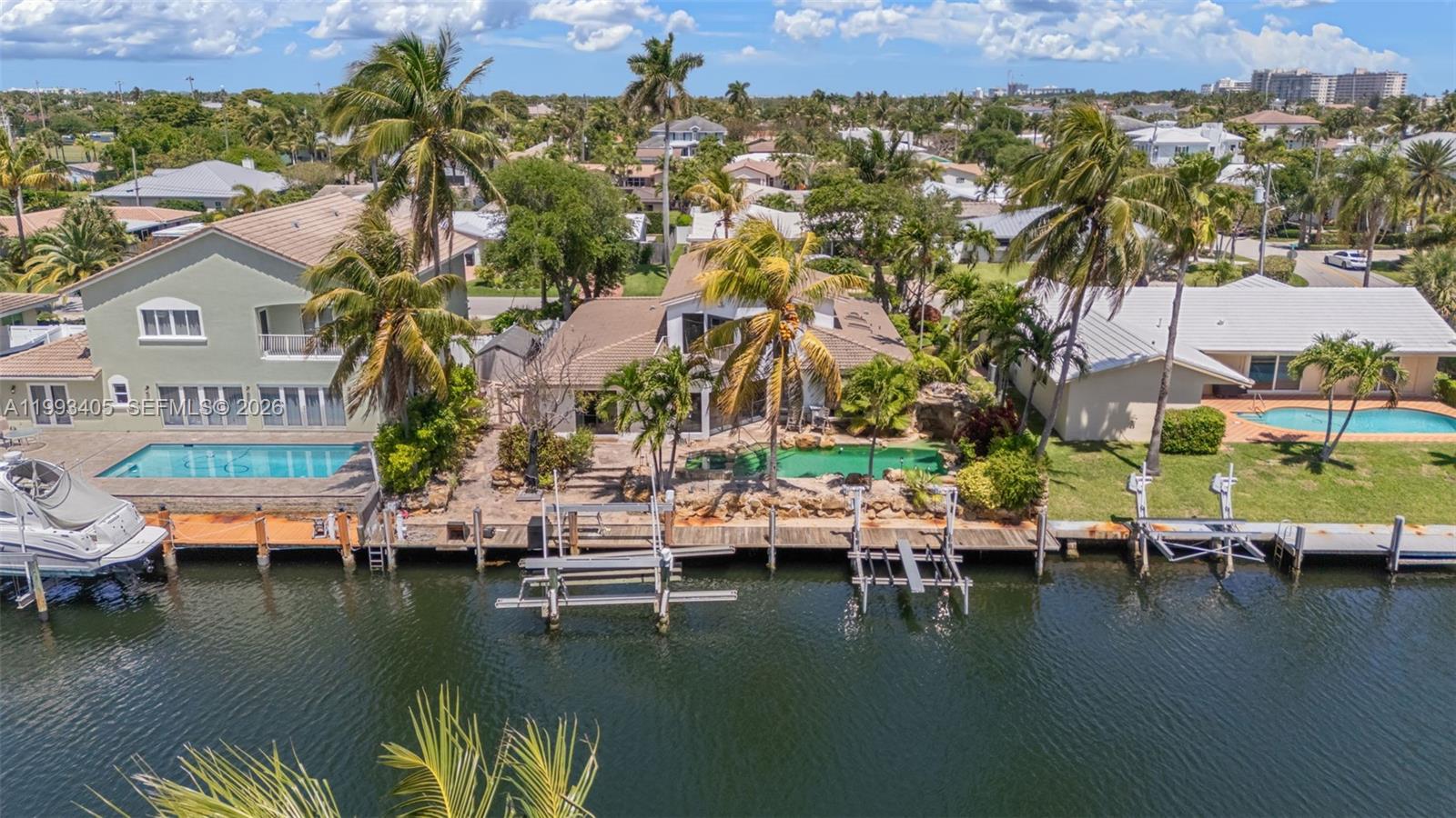 2858 Northeast 33rd Street Lighthouse Point, FL 33064 - Photo 5 of 24 an aerial view of residential houses with outdoor space and lake view