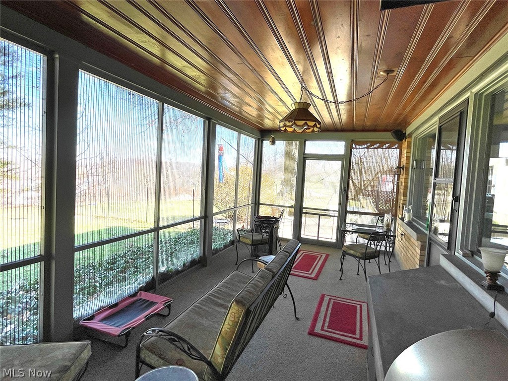 526 Ridgeleigh Street Minerva, OH 44657 - Photo 8 of 28 Sunroom / solarium featuring wood ceiling