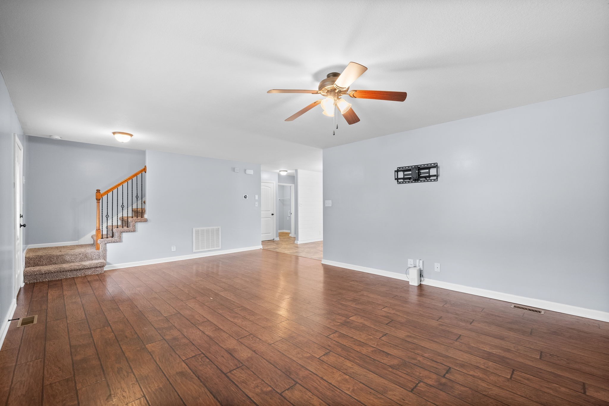 1563 Hazelwood Road Clarksville, TN 37042 - Photo 12 of 43 a view of an empty room with wooden floor