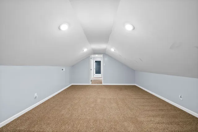 a view of small space with empty racks on the wall