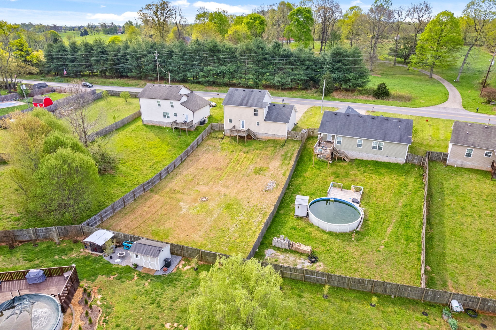 1563 Hazelwood Road Clarksville, TN 37042 - Photo 43 of 43 swimming pool view with a garden and seating area