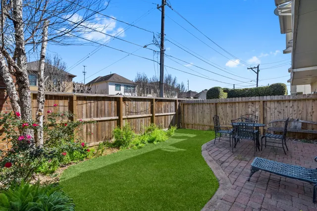 a garden view with a seating space