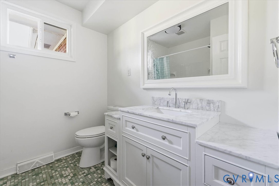 6413 Bull Hill Road Prince George, VA 23875 - Photo 21 of 27 Full bathroom featuring vanity, a shower with curt