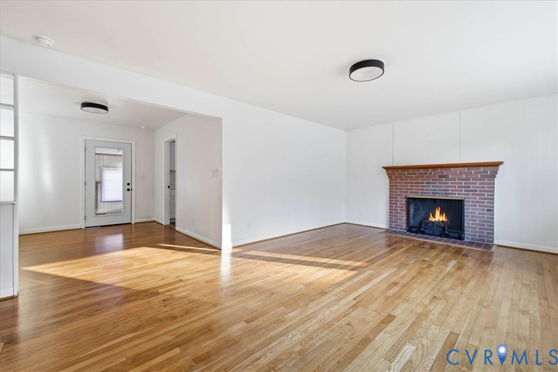 6413 Bull Hill Road Prince George, VA 23875 - Photo 5 of 27 Unfurnished living room featuring light wood-type