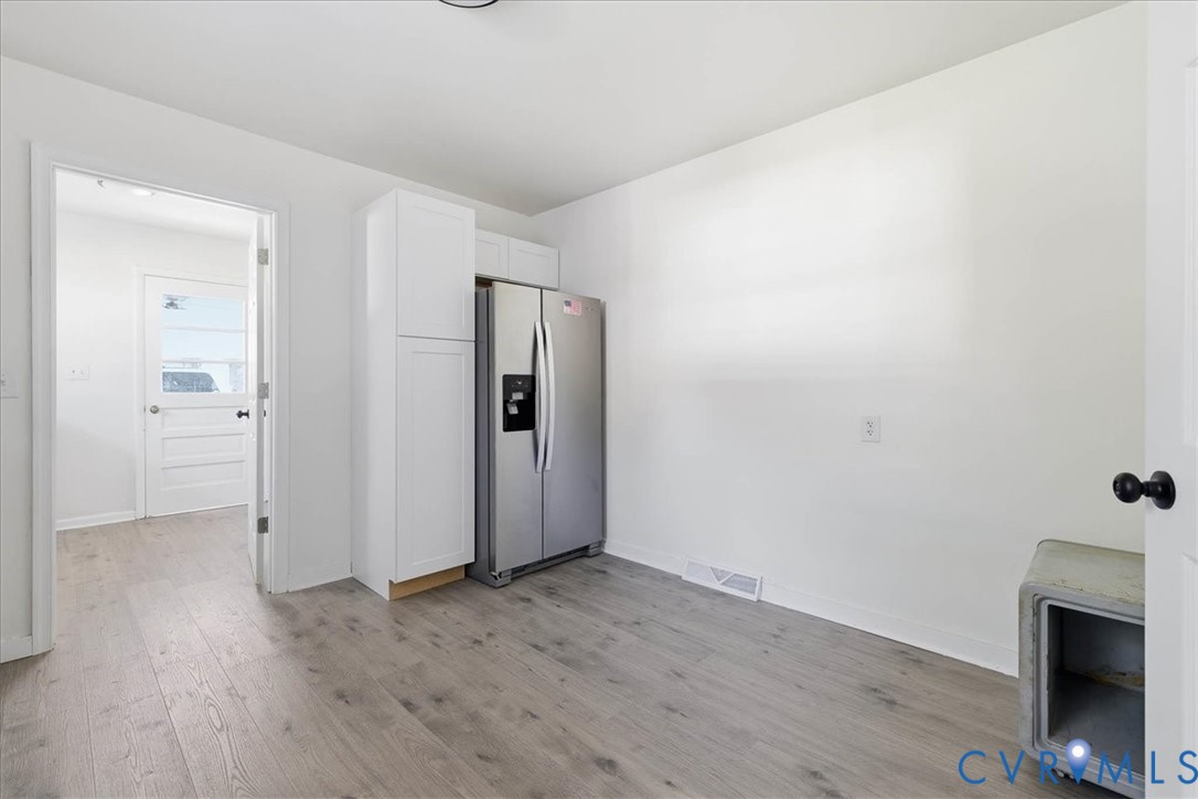 6413 Bull Hill Road Prince George, VA 23875 - Photo 10 of 27 Kitchen featuring stainless steel fridge with ice