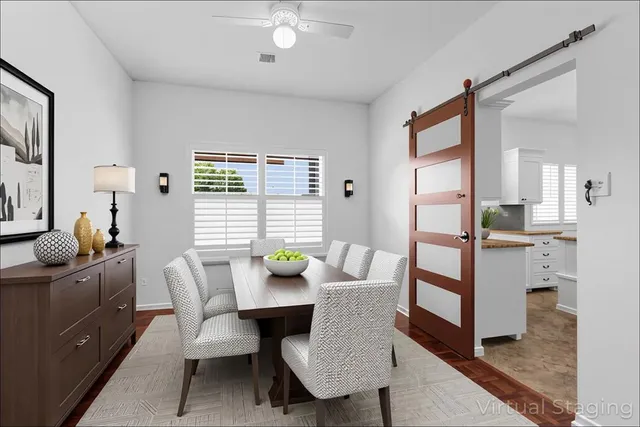 a view of a dining room with furniture