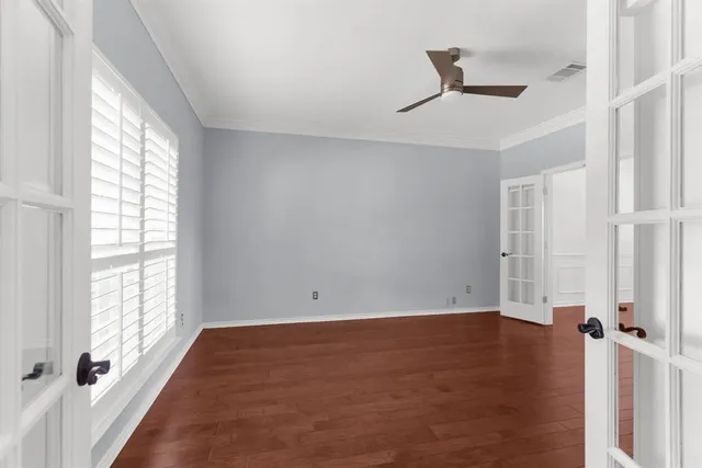 an empty room with windows