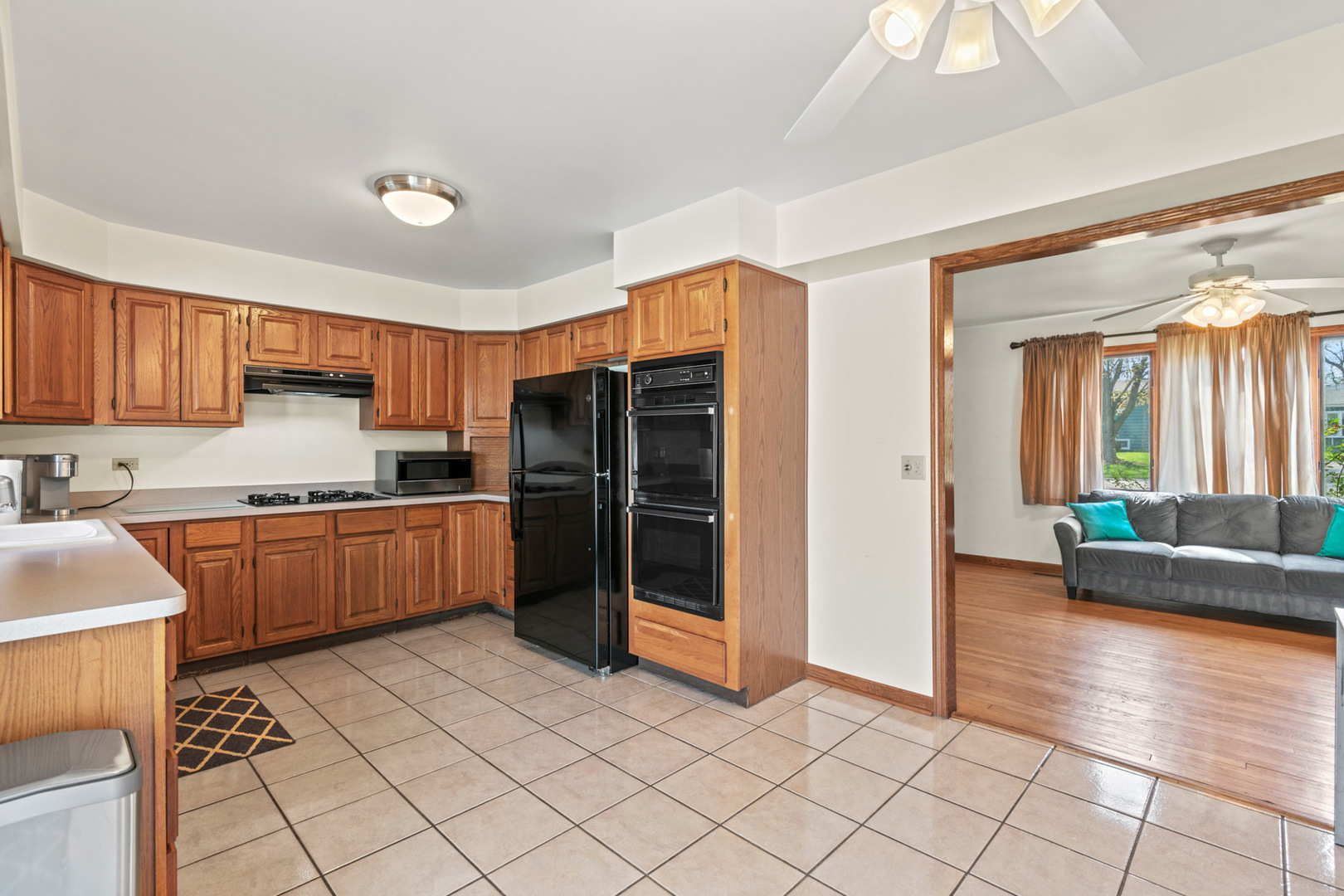 2344 Forest Avenue Rolling Meadows, IL 60008 - Photo 13 of 29 a kitchen with stainless steel appliances a refrigerator and a sink
